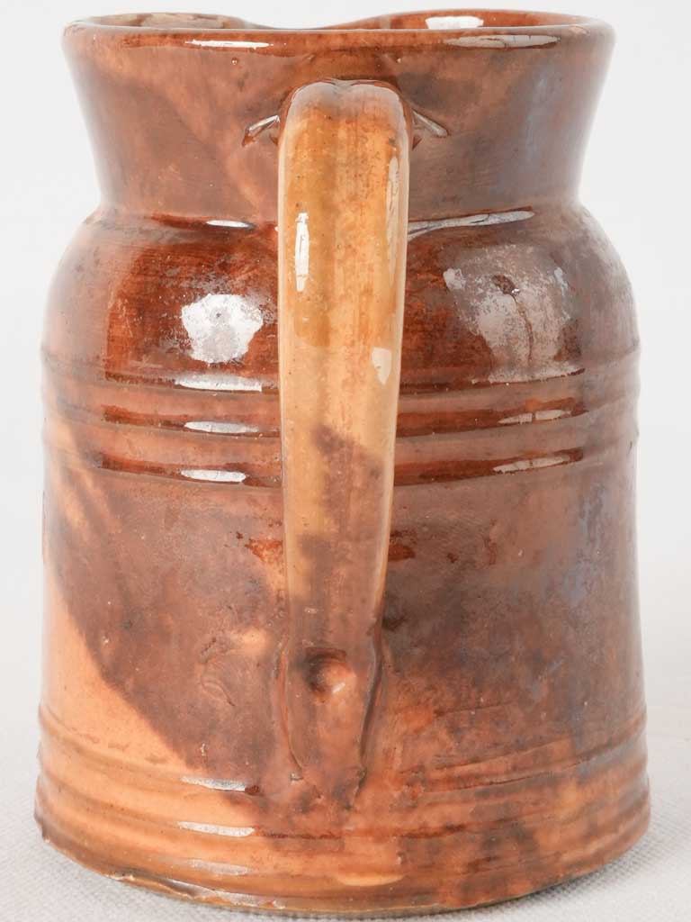 Charming chip-worn historical water pitcher