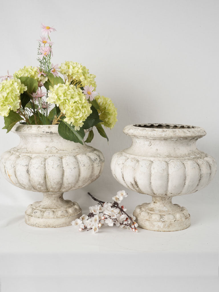 Weathered grey-white patina garden urns