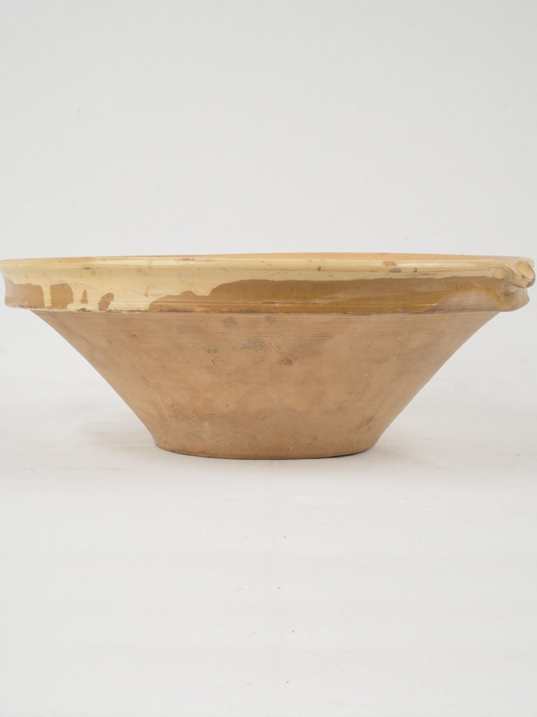 Pale lemon curd-colored antique bowl