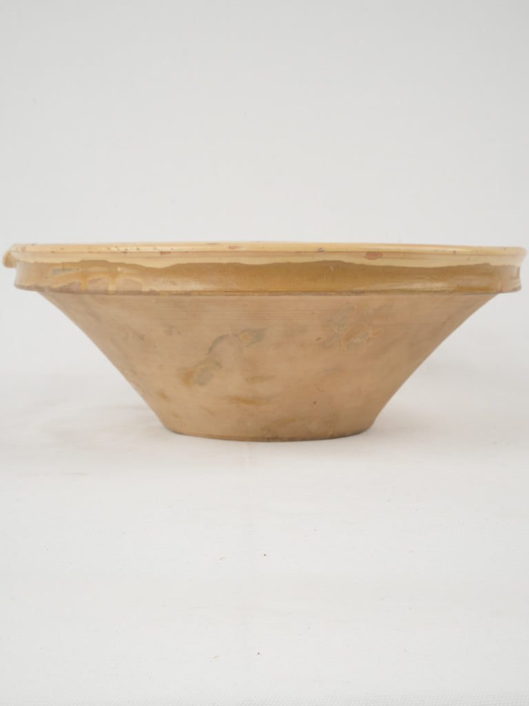 Aged French yellow-glazed mixing bowl