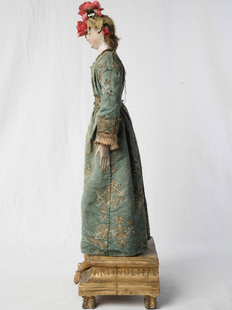 Lifelike glass-eyed devotional piece