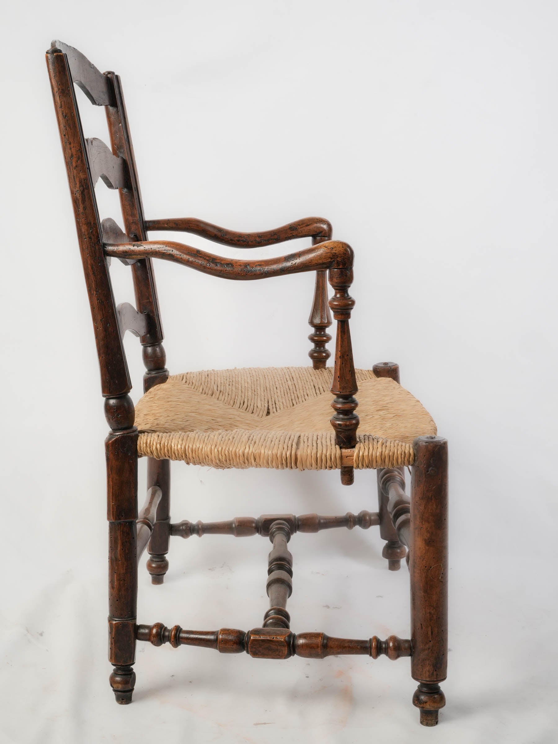 Antique Provençal Walnut Ladder-Back Armchair with Rush Seat - 38¼"
