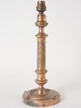 Antique bronze-finished palmette candlestick lamp base