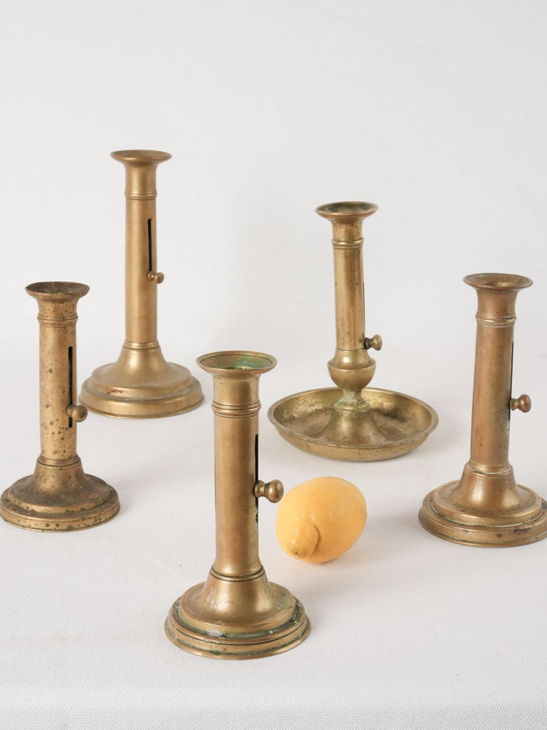 Collection of 5 Napoleon III brass candlesticks w/ levers 9½"