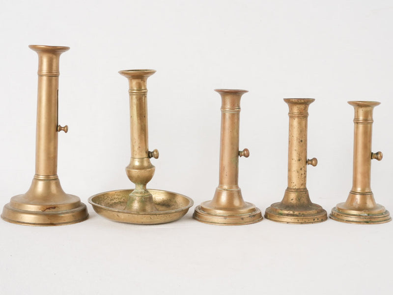 Collection of 5 Napoleon III brass candlesticks w/ levers 9½"