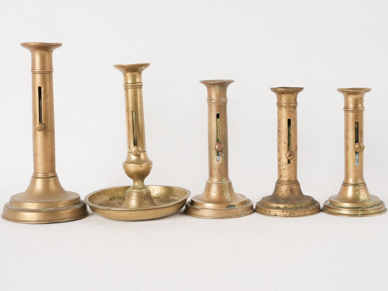 Collection of 5 Napoleon III brass candlesticks w/ levers 9½"