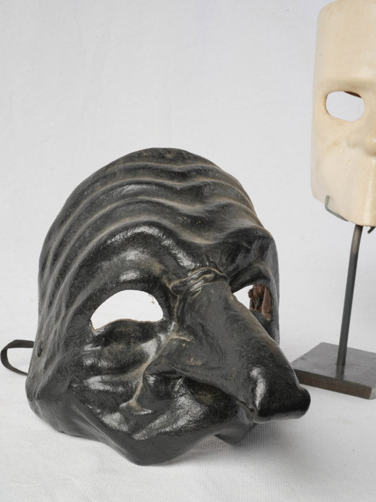 Intriguing timeworn patina mask trio