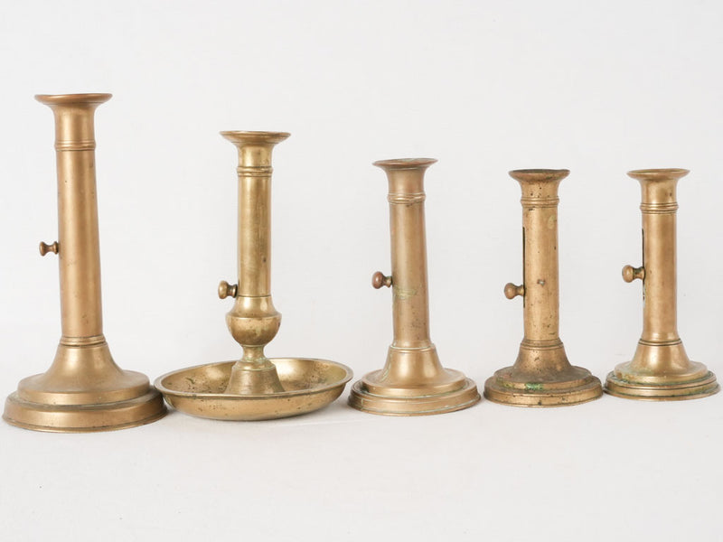 Collection of 5 Napoleon III brass candlesticks w/ levers 9½"