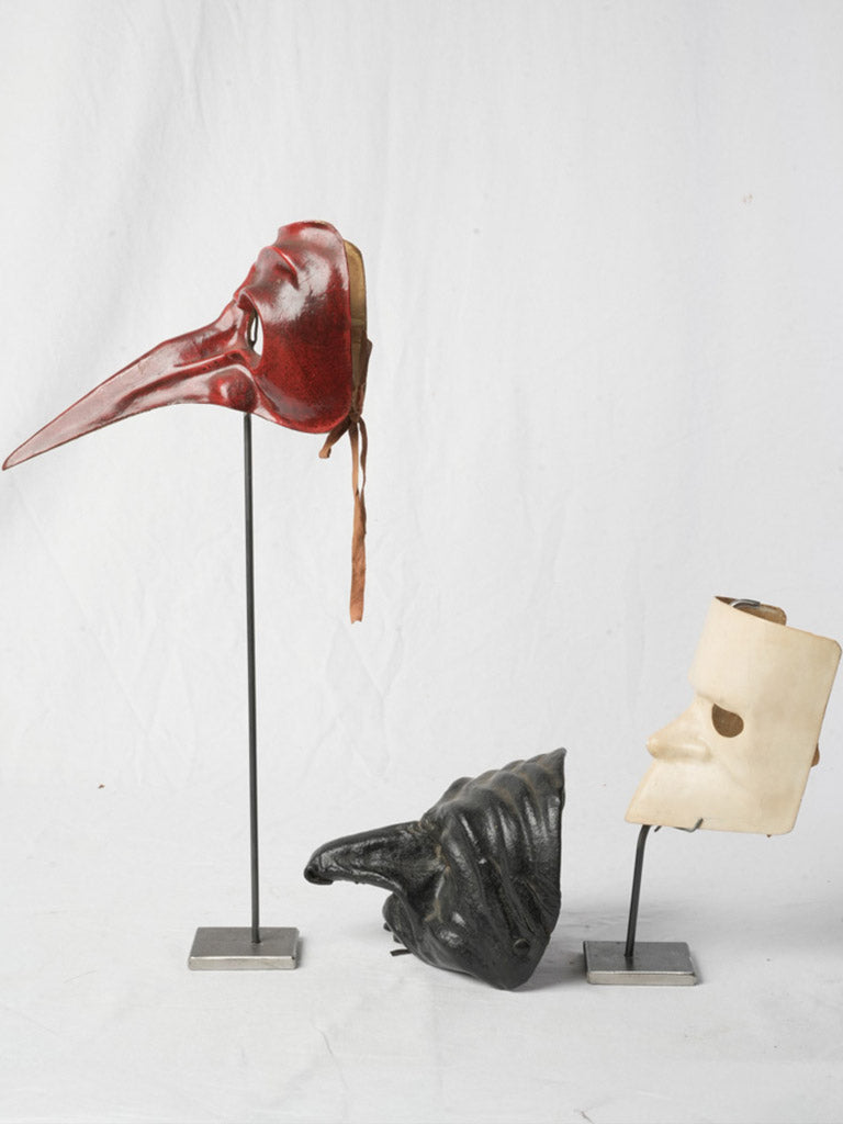 Artisanal moulded leather mask trio