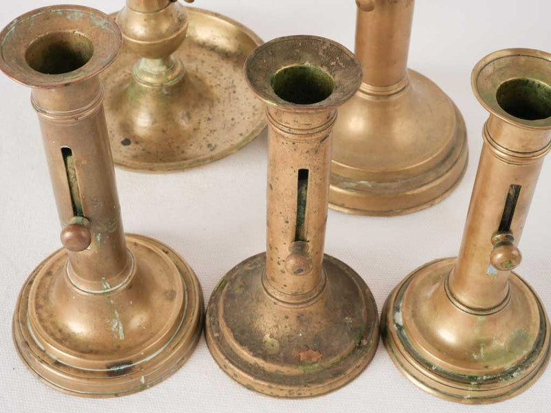 Collection of 5 Napoleon III brass candlesticks w/ levers 9½