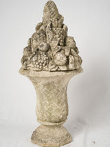 Weathered stone fruit topiary finials