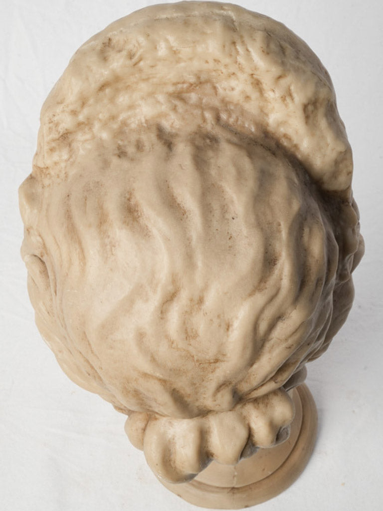 Warm ivory-toned wax bust  