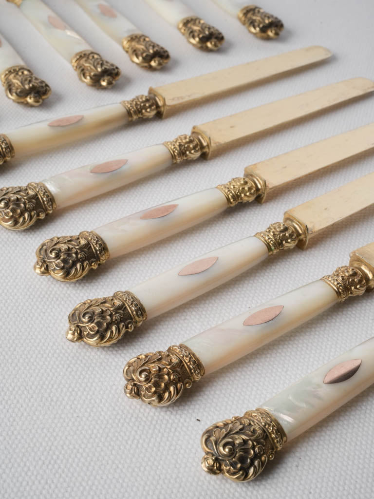 Refined Rococo style dessert knives