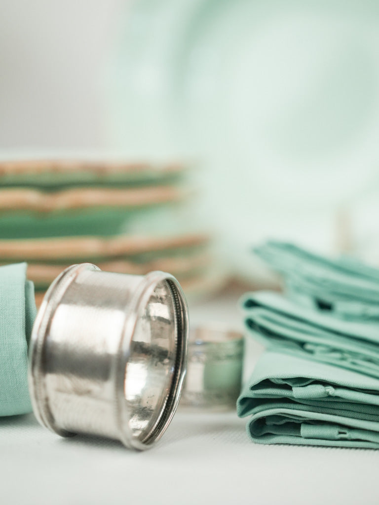 Artisanal, antique napkins and dinnerware set