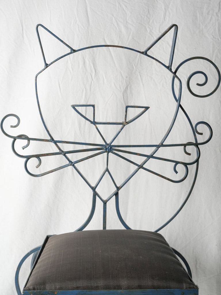 Gracefully coiled tail silhouette chairs.