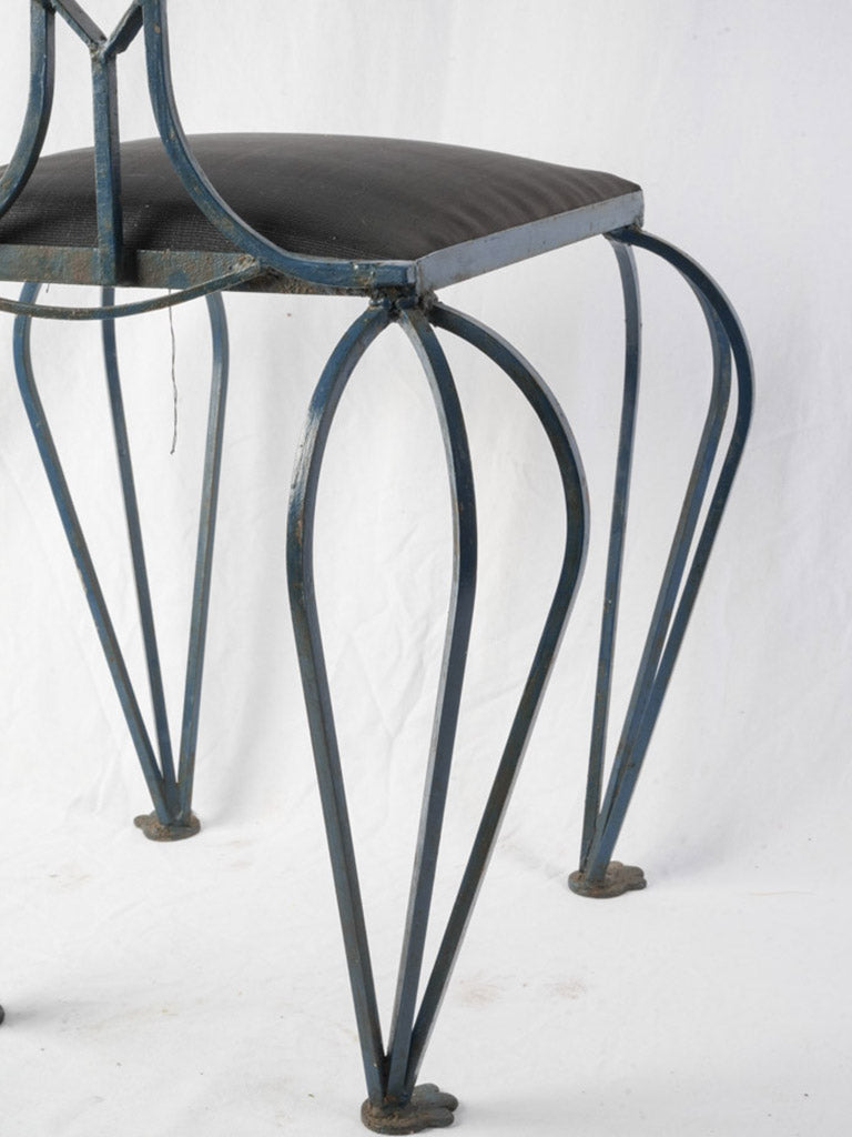 Elevated perch French iron chairs.