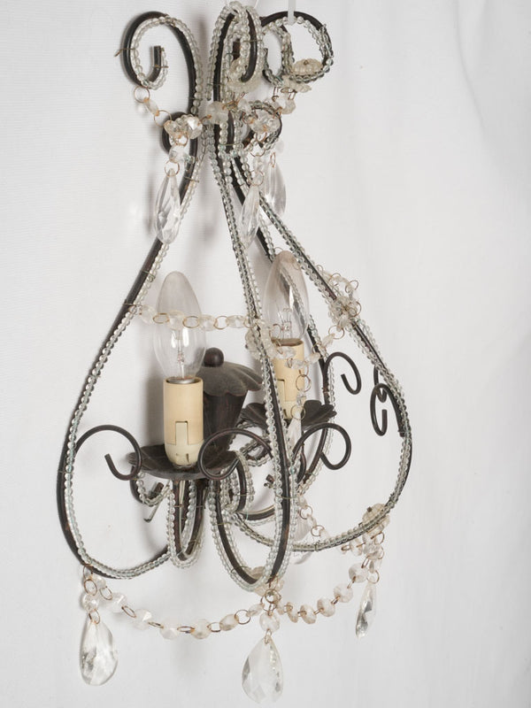 Vintage pair of two-light beaded wall sconces