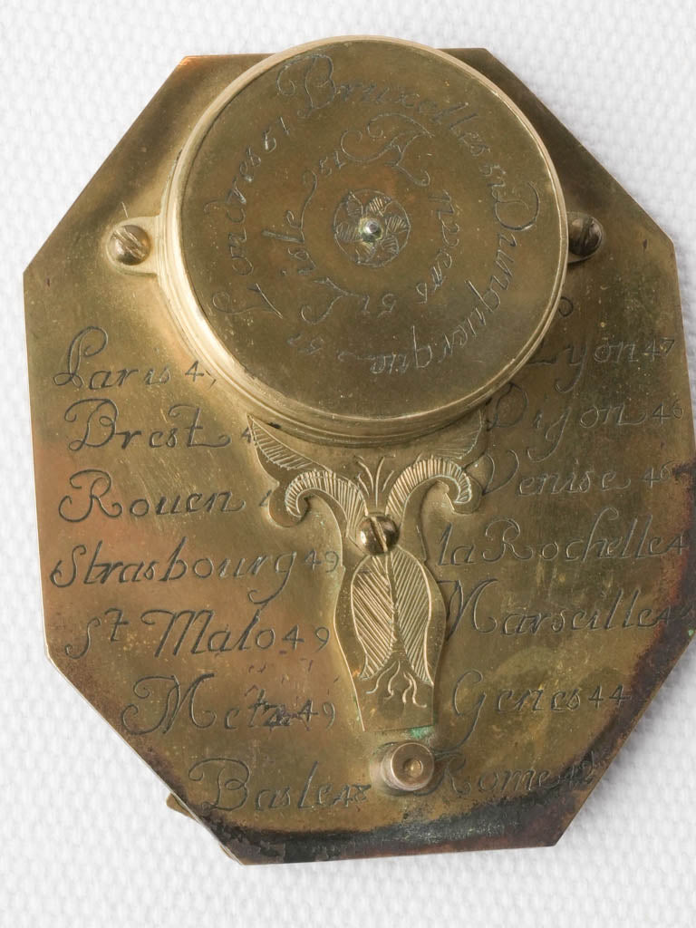 Timeworn leather-cased brass sundial