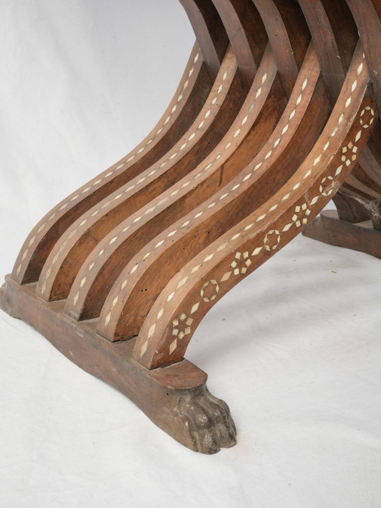 Timeworn intricate Savonarola furniture