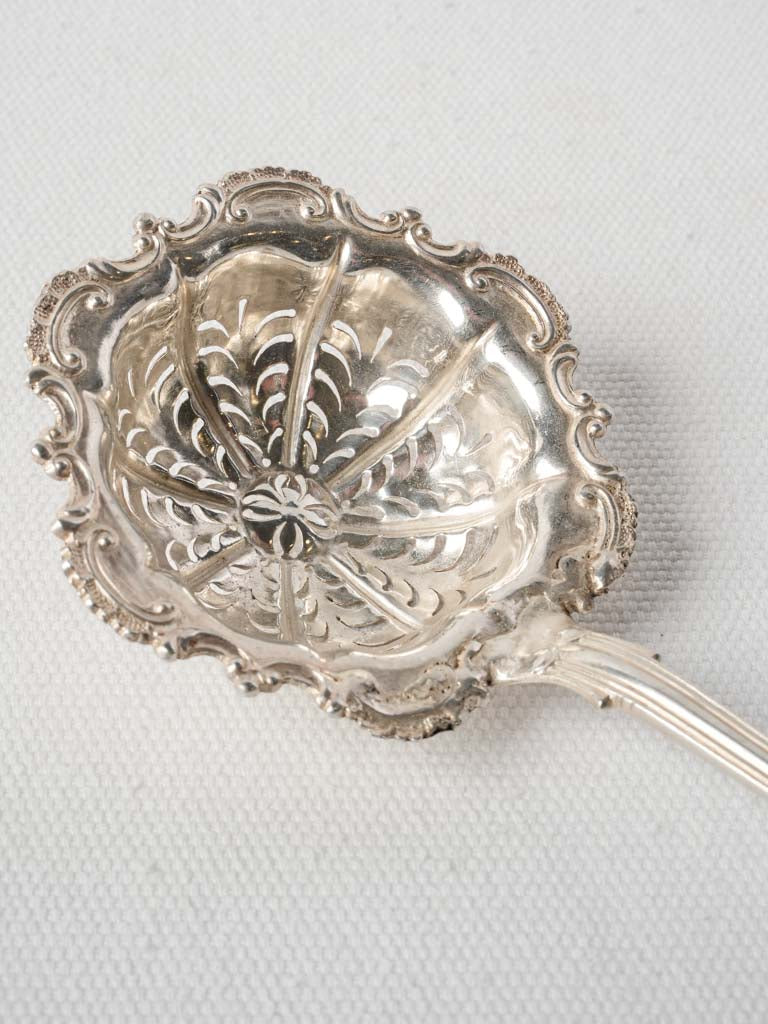 Lustrous patina finished sifter  