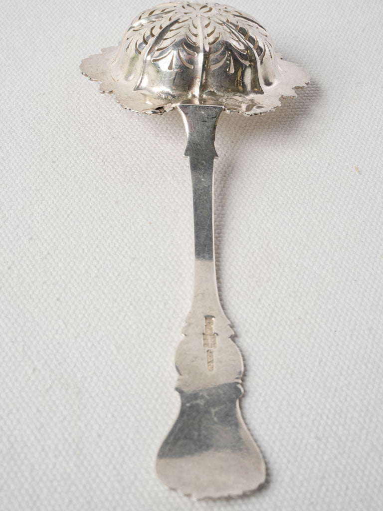 Vintage Rococo-era sugar sifter  