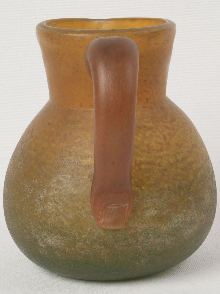 Curved handle Art Nouveau pitcher