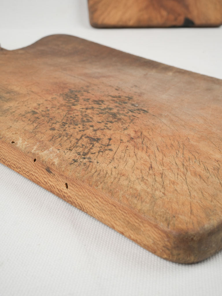 Patina-rich vintage wooden kitchenware trio