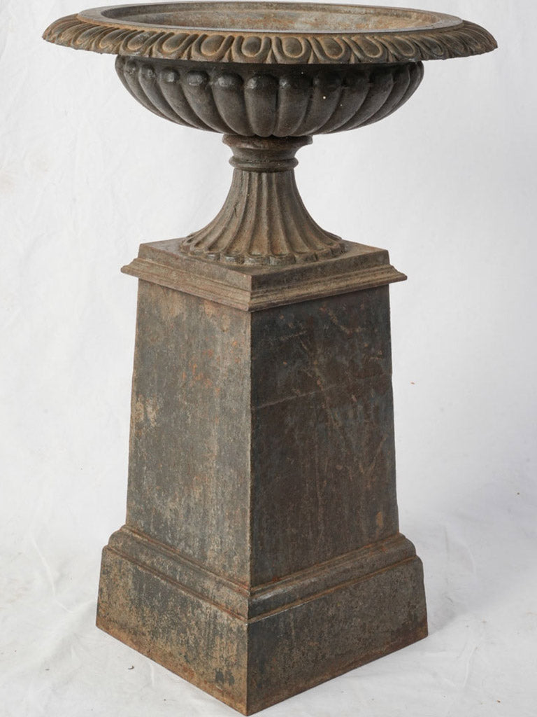 Aged patina iron pedestal urn