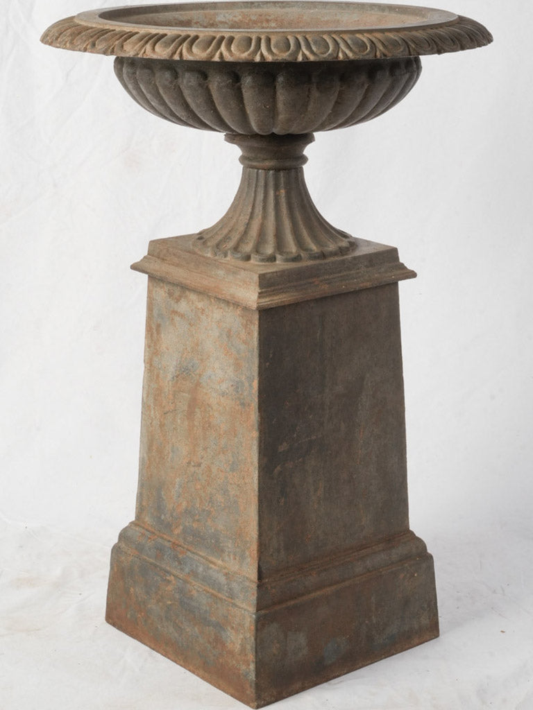 Ornate egg-and-dart lip urn