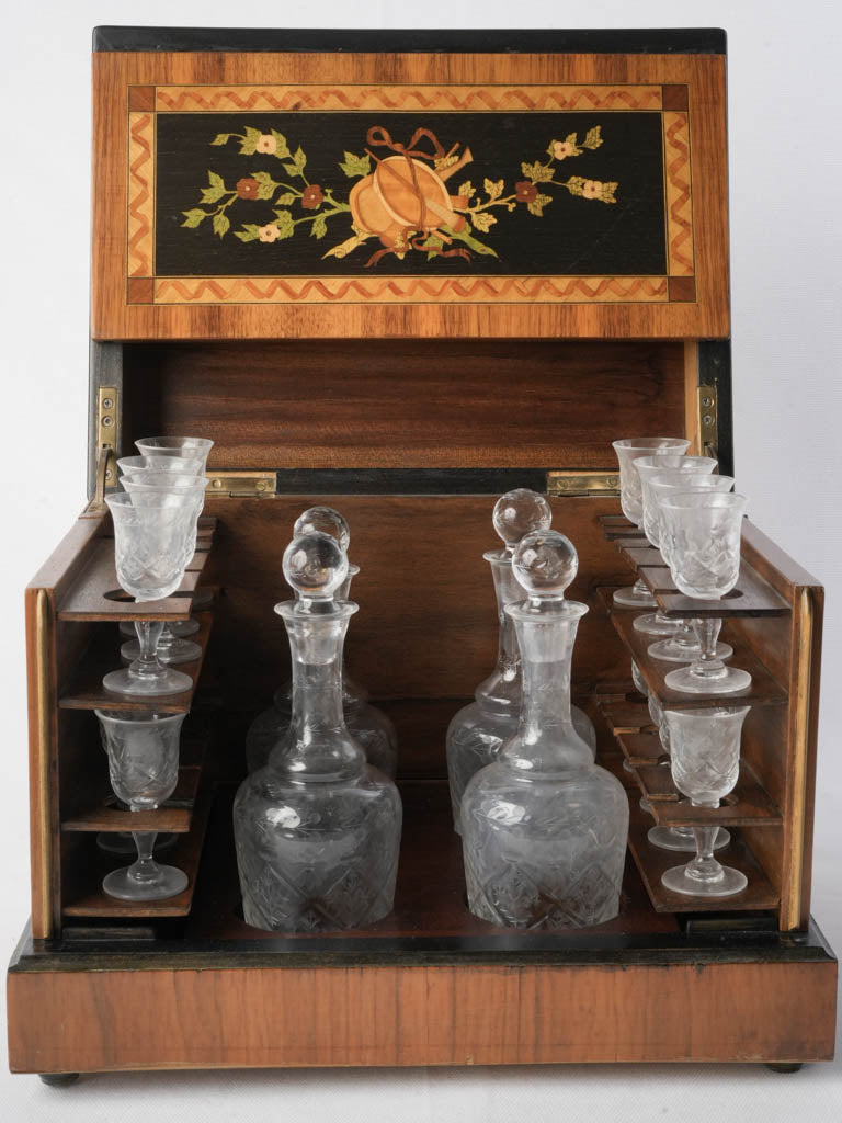Petite Italian drinkware cabinet.