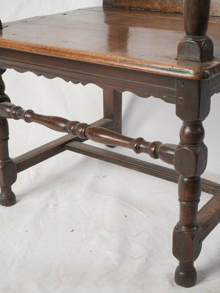 Handcrafted walnut chair with patina  