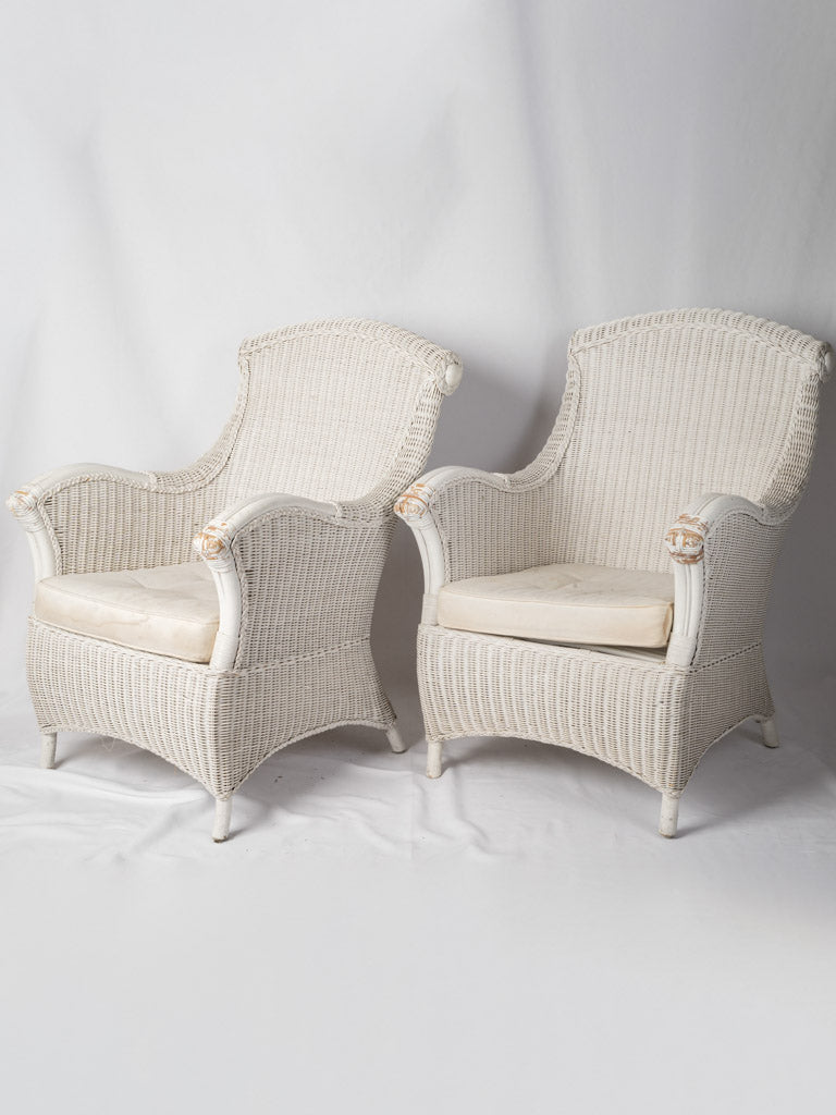 Graceful vintage wicker armchairs
