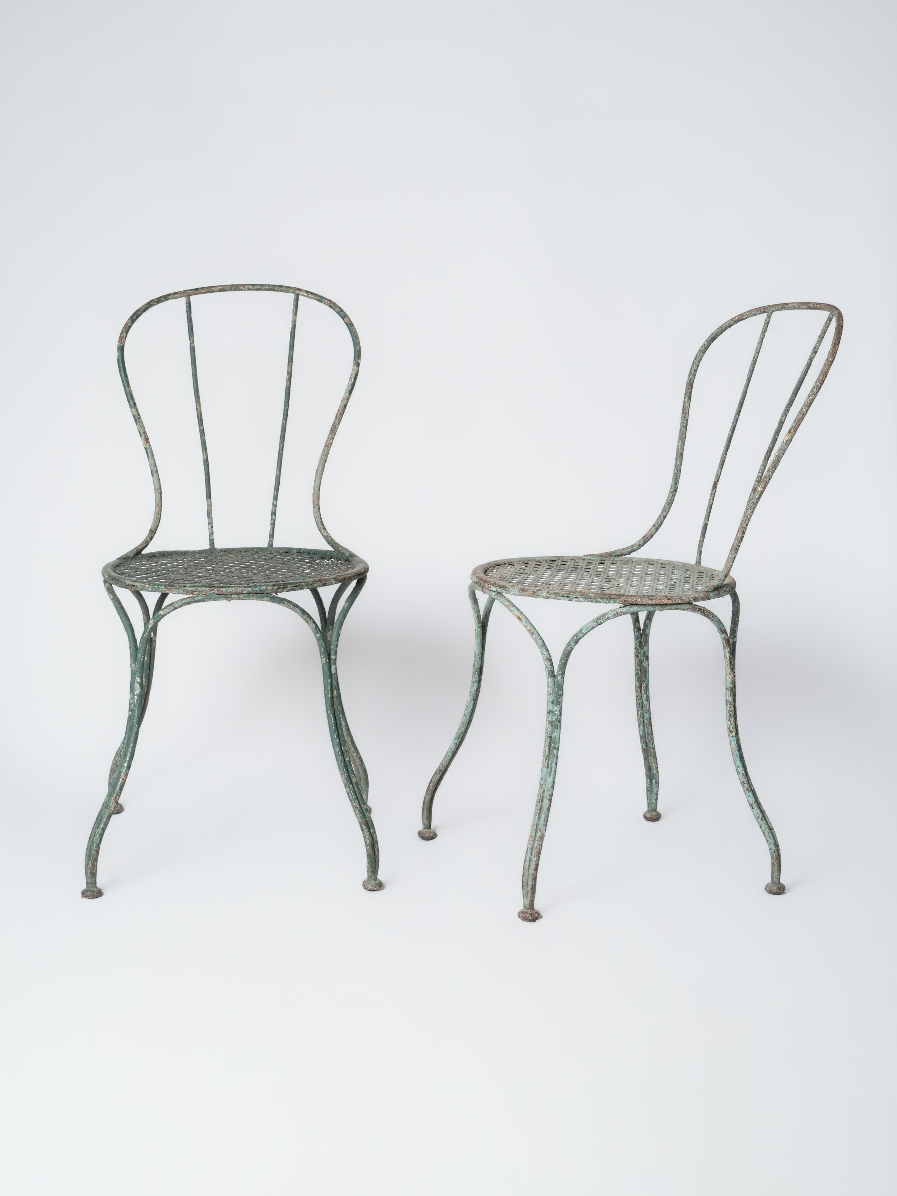 Pair of Mid-20th-Century French Green-Painted Decorative Garden Chairs - 33"