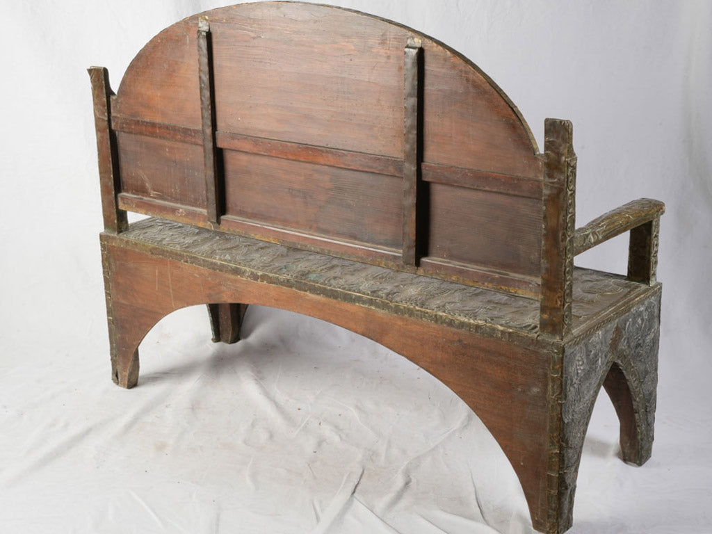 Intricate leather medallion bench  