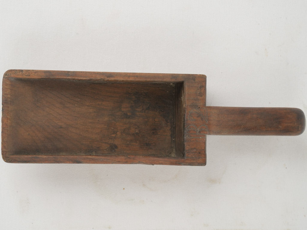 Handcrafted wooden kitchen grain scoop