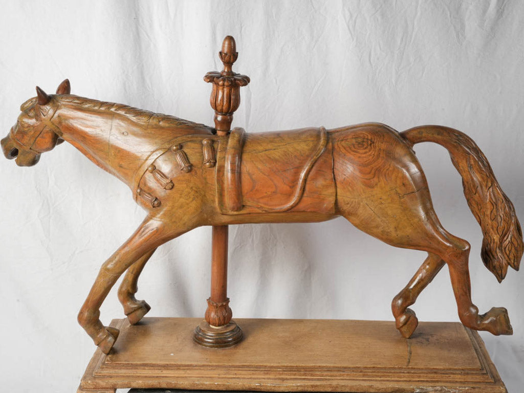 Patina-rich vintage horse on stand  