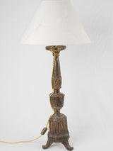 Aged woodworm-detail electric lamp