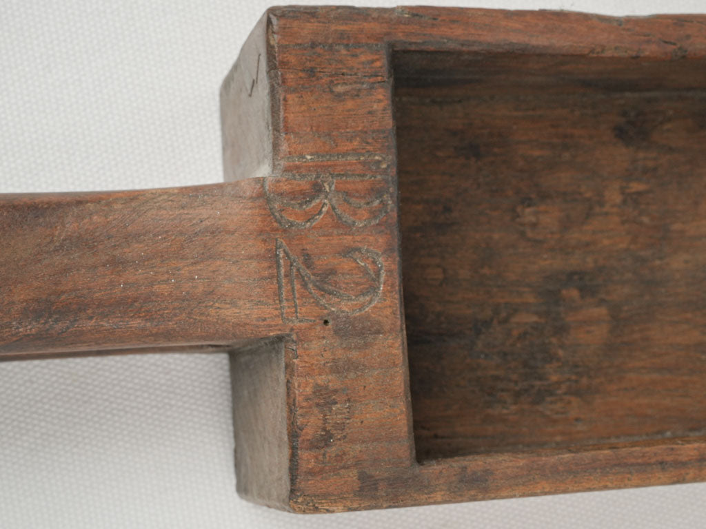 Old-fashioned rustic wooden grain scoop