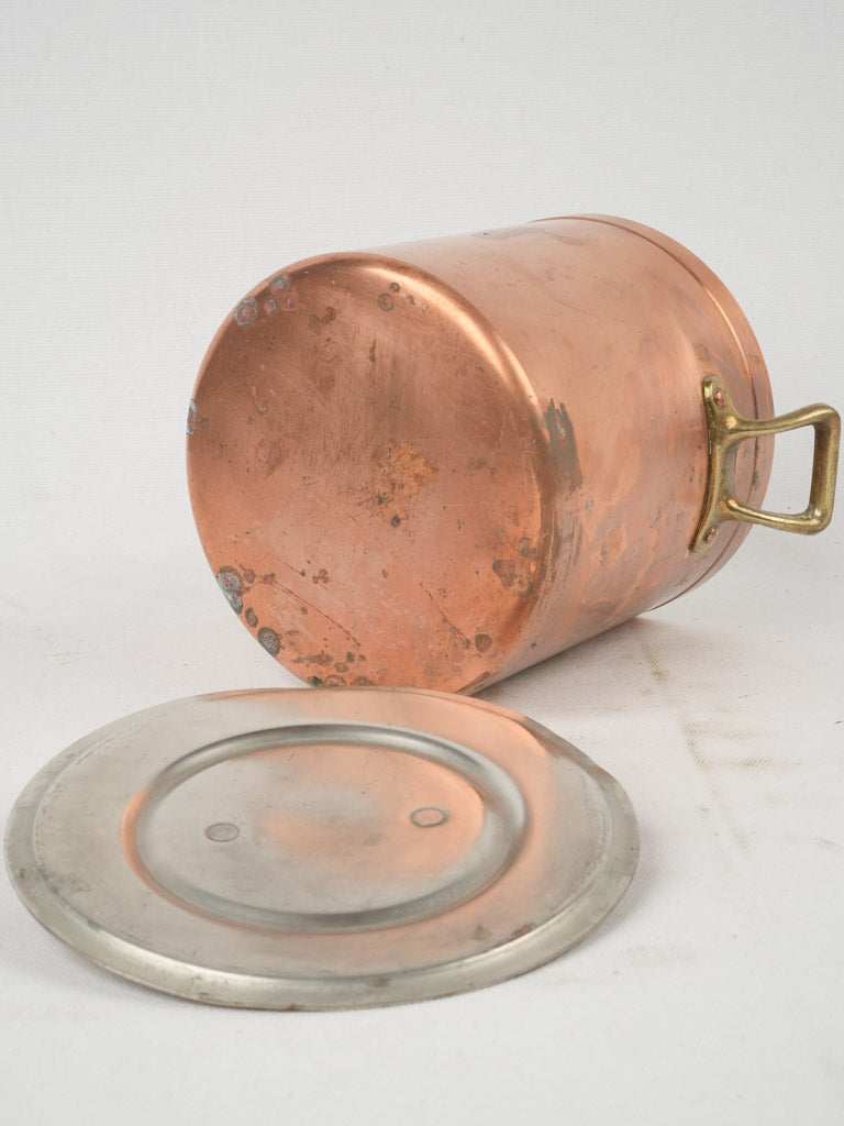 Delightful old metal pot for French cuisine