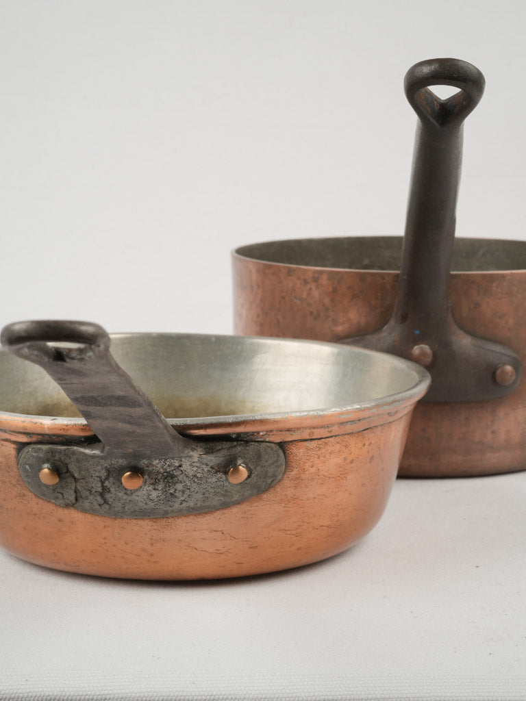 Patina-adorned French copper cookware