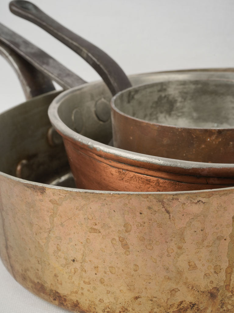 Timeless aged copper cooking vessels