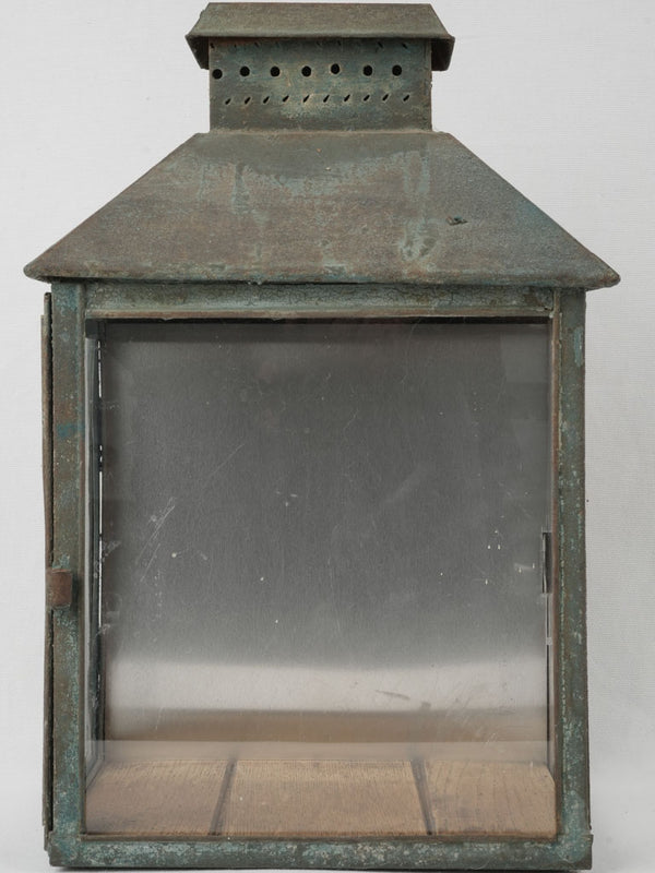Vintage, weathered Provencal glass lantern