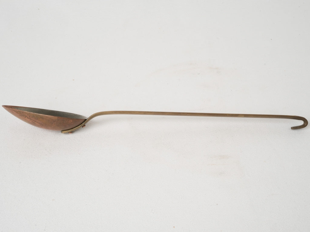 Vintage, collectible French copper kitchen spoon