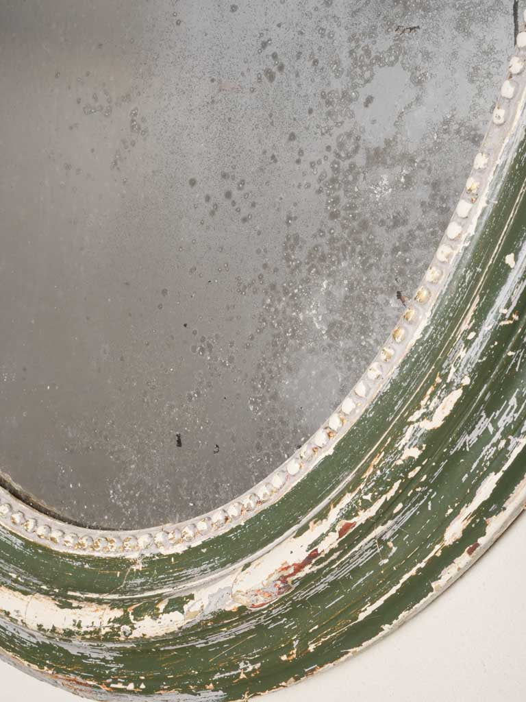 Mercury-glass foxed ornate mirror  