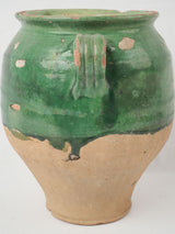 Rustic green-glazed ceramic vessel