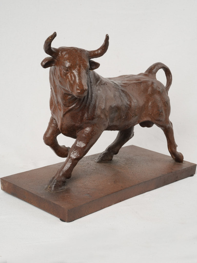 Antique cast-iron bull sculpture  