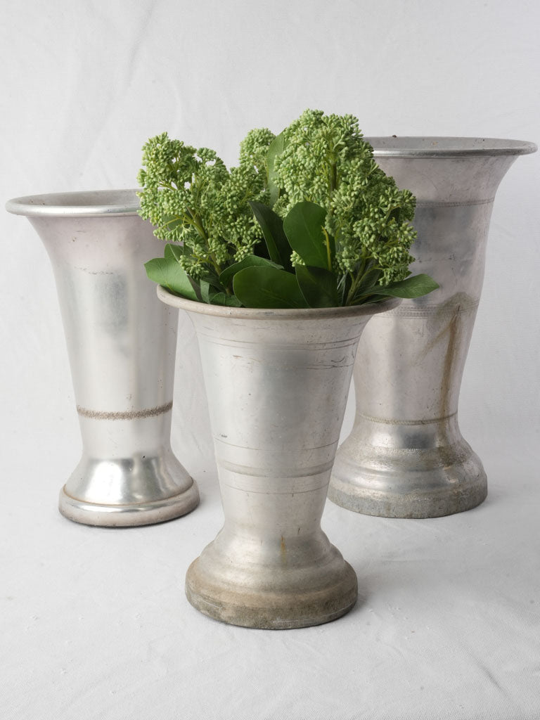 Timeworn vintage French florist vases