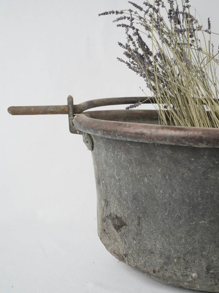 Well-worn copper wine domain cauldron