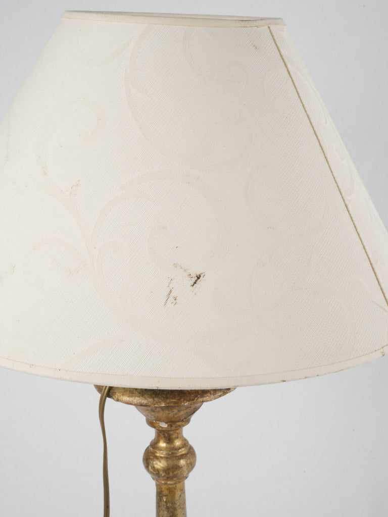 Regal nineteenth-century candlestick lamp
