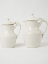 Elegant lidded Limoges porcelain jugs